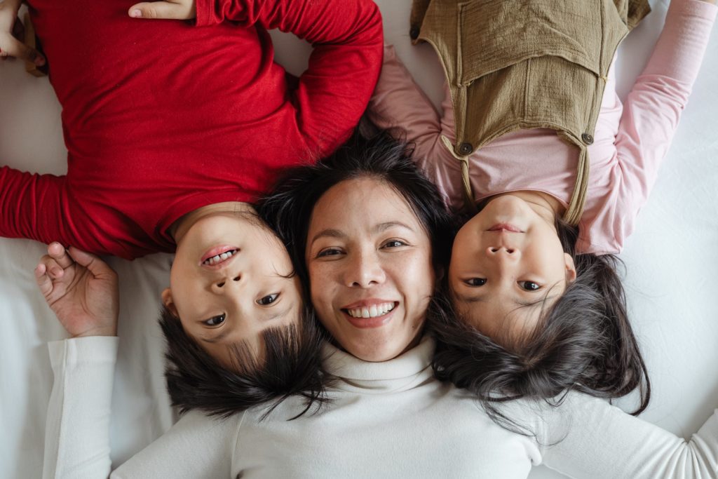 Family resting together, illustrating financial security and life insurance protection