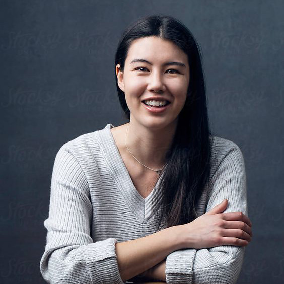 Learn More 24 Tomiko Fine, author and contributor to Shoot for the Edit, smiling portrait.